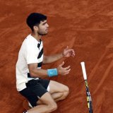 Carlos Alcaraz: une finale inoubliable pour son cinquième titre en Grand Chelem. KEYSTONE/EPA/YOAN VALAT